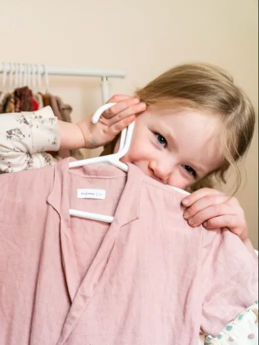 The child chooses minimalistic colors for his wardrobe