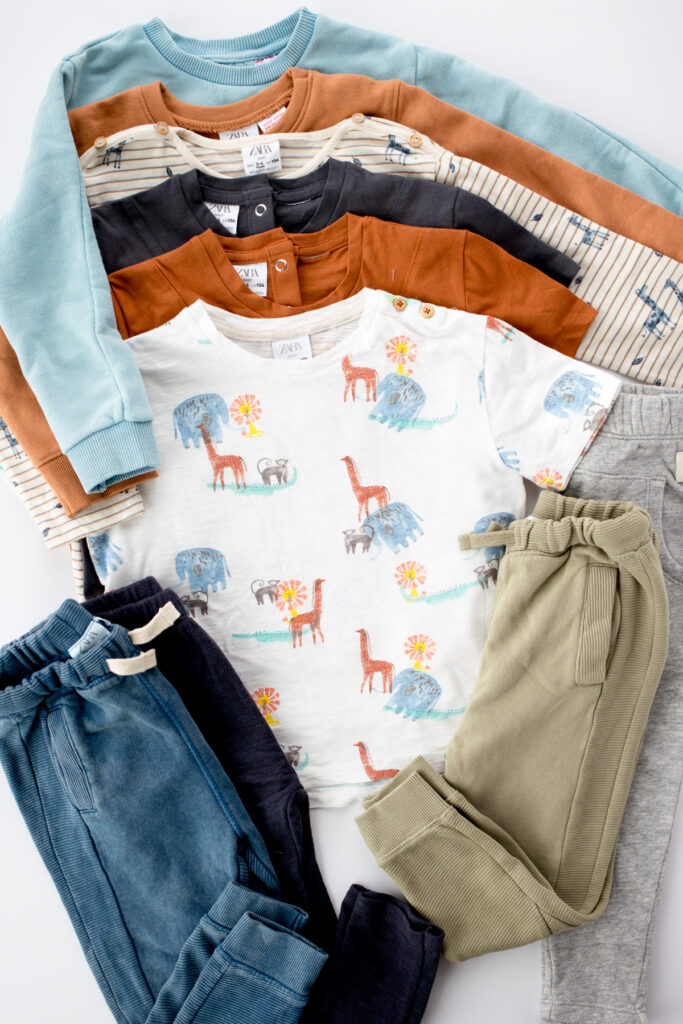 A variety of clothes for children that can be used to make a capsule wardrobe