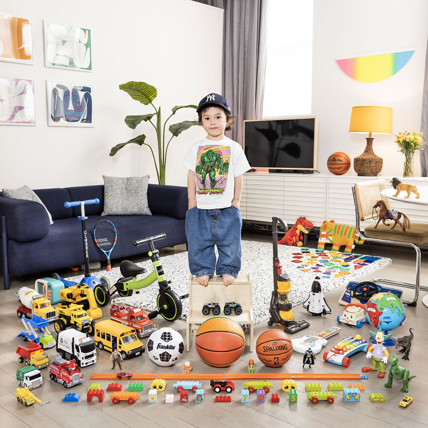 Boy Showcasing Their Toy Collections